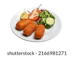 Small photo of White plate with three Shrimps croquettes ans salad. Isolated with clipping path