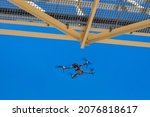 drone under a bridge doing an inspection