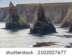 The Sea Stacks And Cliffs At...