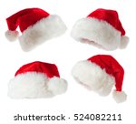 Set of red Santa hats isolated on white background