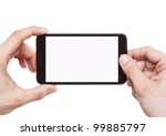 Taking photo with mobile smart phone isolated on white background with clipping path for the screen
