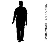 silhouette of a walking girl on ... | Shutterstock . vector #1717774207