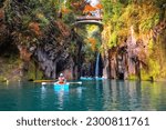 Small photo of Miyazaki, Japan - Nov 24 2022: Takachiho Gorge is a narrow chasm cut through the rock by the Gokase River, plenty activities for tourists such as rowing and trekking through beautiful nature
