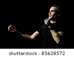 Small photo of SEATTLE - APRIL 6: Spoken word artist, rock star, singer, movie star, actor, poet, activist Henry Rollins speaks on stage at the Triple Door Theater in Seattle, WA on April 6, 2011.