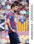 Small photo of BARCELONA - SEP 17: Pique warms up prior to the La Liga match between FC Barcelona and Elche CF at the Spotify Camp Nou Stadium on September 17, 2022 in Barcelona, Spain.