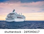 Big Cruise Ship In The Sea At...
