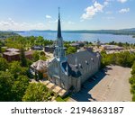 Small photo of Saint Patrice Church aerial view at 115 Rue Merry N in historic downtown of Magog, Memphremagog County, Quebec QC, Canada.