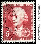 Small photo of LUGA, RUSSIA - OCTOBER 15, 2019: A stamp printed by SWITZERLAND shows Swiss physicist, mathematician, astronomer, geographer, logician and engineer Leonhard Euler, circa 1957