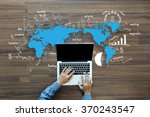 World map with creative thinking drawing charts and graphs business success strategy plan ideas,  With Man hand working on laptop computer keyboard with blank screen monitor, Top View
