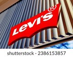 Small photo of Poznan, Poland - November 9, 2023: Levi Strauss logo on a wall. Levi Strauss founded in 1853, is a privately held American clothing company known worldwide for its Levi's brand of denim jeans