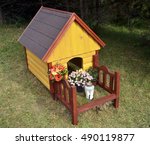 Wooden Dog House As A Monument...