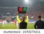 Man shows players substitution...