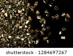 stock-photo-shiny-background-background-of-gold-particles-new-year-christmas-background-for-your-design-1284697267.jpg