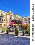 Small photo of PALERMO, SICILY, ITALY - SEPTEMBER 23, 2018: Palermo square Beati Paoli. Beati Paoli is name of a secretive sect; today it can be found in Capo district where a square, a kiosk and a bear restaurant.