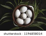 6 White Eggs Inside A Ceramic...