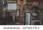Small photo of Singer, Songwriter, home recording and music producer flat lay concept. Ideal for home pages, diary, advertising, poster and so on. Lifestyle musician stuff on a vintage, aged, wooden table. Filtered