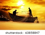 Silhouette Of Fishermen With...