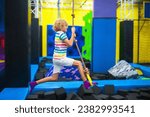 Child jumping in trampoline...