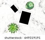 Succulent plants, tablet PC, phone on marble background. Office table. Flat lay mock up for social media blog