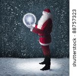 Santa Claus Holding Glowing...