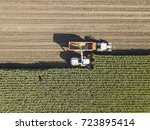 Machines Harvesting Corn In The ...