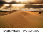 Sunset Over The Sand Dunes In...