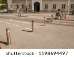 Automatic retractable bollards limiting traffic on the road in the old town of Salzburg, Austria