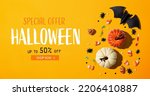 Small photo of Halloween sale banner with Halloween decorations - flat lay