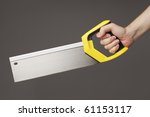 Small photo of Man holding a backsaw aka tenon saw in his hand.