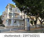 Small photo of TEL-AVIV, ISRAEL - DECEMBER 03, 2023: House with the sculptural composition CHORUS on Rothschild Boulevard