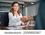 Small photo of Happy mid aged business woman manager handshake at office meeting. Smiling female hr hires recruit at job interview, bank insurance agent, lawyer making contract deal with client at work. Onboarding.