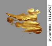 hand drawing gold brush stroke... | Shutterstock .eps vector #561119017