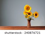 Sunflower In A Ceramic Vase On...