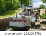 Small photo of Gota canal, Sweden, July, 2017: Tourist boat at a lock on Gota canal in Sweden