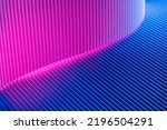 Abstract geometric background with magenta and blue hues. Corrugated lines futuristic backdrop.