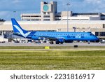 Small photo of West Palm Beach, United States - November 13, 2022: Breeze Airways Embraer 195 airplane at Palm Beach airport (PBI) in the United States.