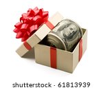 Holiday bonus.  Money roll laying in red bow decorated gift box.