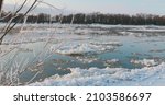 Small photo of Ice drift on river. Ice in motion during early spring. Floating Of Ice In Spring. Springtime ice drifting on the river. 4K.