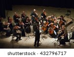 Small photo of DNIPRO, UKRAINE - JUNE 6, 2016: FOUR SEASONS Chamber Orchestra - main conductor Dmitry Logvin perform at the State Russian Drama Theatre