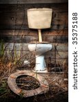 Photo Of An Old Broken Toilet...