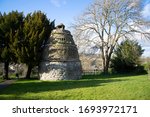 Small photo of A view of a circa 16th century circular, beehive dovecot, also known as the Ross Doocot at Learmonth Gardens, Linlithgow, West Lothian, Scotland. It has 370 nesting boxes.