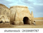 Small photo of Nefta, Tunisia - October 14, 2006: Remains of George Lucas Star Wars The Phantom Menace movie set of Mos Espa near Nefta town