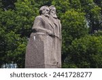 Small photo of Shanghai, China - March 24, 2013: Monument of Karl Heinrich Marx and Friedrich Engels in Fuxing Park in the former French Concession of Shanghai