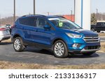 Small photo of Peru - Circa March 2022: Used Ford Escape display at a dealership. With supply issues, Ford is relying on pre-owned car sales to meet demand.
