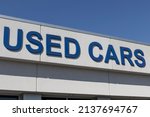 Small photo of Used Car sign at a pre-owned car dealership. As supplies of new cars dwindle, used cars become more popular.
