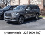 Small photo of Fishers - Circa March 2023: Used Lincoln Navigator display. With supply issues, Lincoln is relying on pre-owned car sales to meet demand.