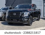 Small photo of Indianapolis - November 12, 2023: Nissan Titan display at a dealership. Nissan offers the Titan in King Cab and Crew cab models.
