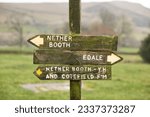 Small photo of Old wooden footpath sign pointing to Nether Booth and Edale. Peak District, Derbyshire, UK