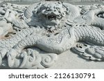 Stone Carving With Dragon In...