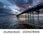 Fishing Pier At Sunrise In...